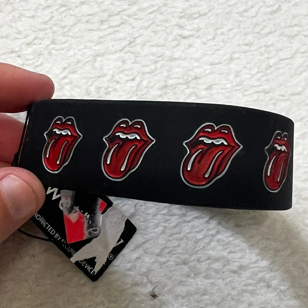 Bundle of 4 Rubber Rock Band Bracelets NWT
